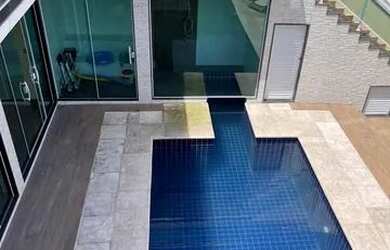 Imagem: A casa possui 5 Dormitórios, 5 Banheiros, 5 Vagas na garagem