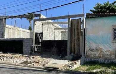 Imagem: A casa possui 3 Dormitórios, 2 Banheiros, 3 Vagas na garagem