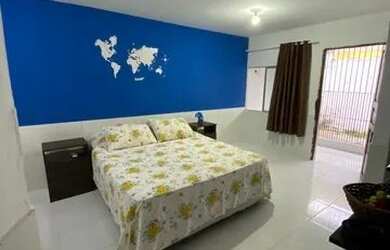 Imagem: A casa possui 4 Dormitórios, 2 Banheiros, 2 Vagas na garagem