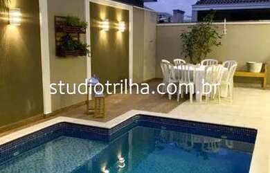 Imagem: A casa em condomínio possui 4 Dormitórios, 5 Banheiros, 2