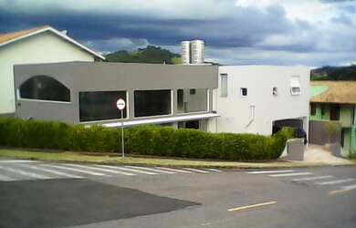 Imagem: A casa possui 5 Dormitórios, 5 Banheiros, 4 Vagas na garagem