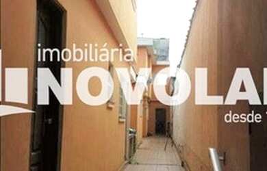 Imagem: A casa possui 5 Dormitórios, 4 Banheiros, 2 Vagas na garagem