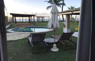 Imagem: A casa possui 4 Dormitórios, 4 Banheiros, 2 Vagas na garagem