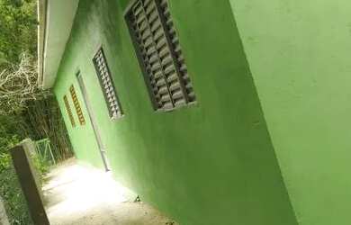 Imagem: A casa possui 2 Dormitórios, 1 Banheiro, Churrasqueira e está