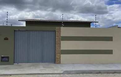 Imagem: A casa possui 3 Dormitórios, 2 Banheiros, 3 Vagas na garagem