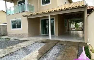 Imagem: A casa possui 3 Dormitórios, 3 Banheiros, 2 Vagas na garagem