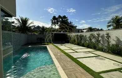 Imagem: A casa em condomínio possui 5 Dormitórios, 5 Banheiros, 2