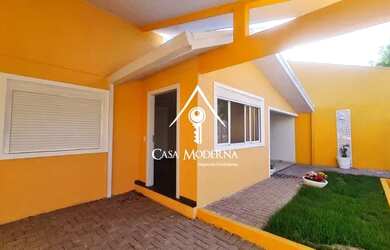 Imagem: A casa possui 2 Dormitórios, 3 Banheiros, 2 Vagas na garagem