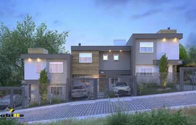 Imagem: A casa possui 3 Dormitórios, 3 Banheiros, 2 Vagas na garagem