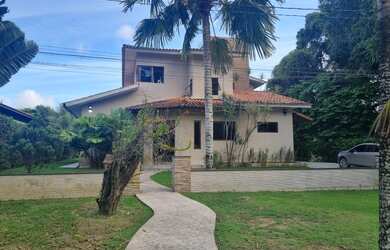Imagem: A casa possui 5 Dormitórios, 5 Banheiros, 3 Vagas na garagem