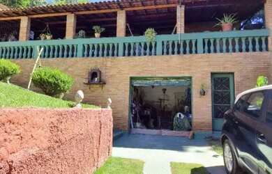 Imagem: A casa possui 5 Dormitórios, 5 Banheiros, 5 Vagas na garagem