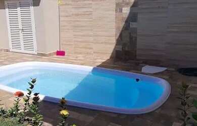 Imagem: A casa possui 3 Dormitórios, 2 Banheiros e está localizado