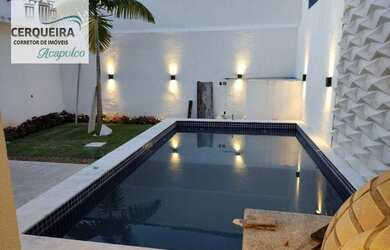 Imagem: A casa possui 3 Dormitórios, 4 Banheiros, 2 Vagas na garagem