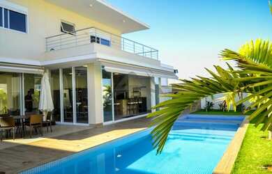 Imagem: A casa em condomínio possui 5 Dormitórios, 5 Banheiros, 5