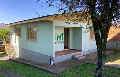 Imagem: A casa possui 3 Dormitórios, 1 Banheiro, 1 Vaga na garagem