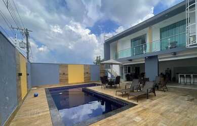 Imagem: A casa possui 3 Dormitórios, 4 Banheiros, 4 Vagas na garagem