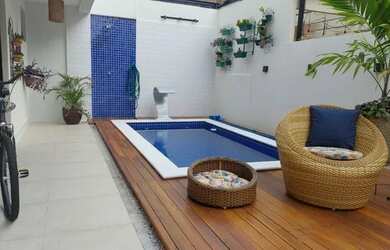 Imagem: A casa em condomínio possui 3 Dormitórios, 3 Banheiros, 2