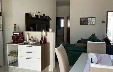 Imagem: A casa possui 3 Dormitórios, 2 Banheiros, 2 Vagas na garagem