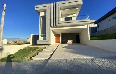 Imagem: A casa em condomínio possui 3 Dormitórios, 3 Banheiros, 4