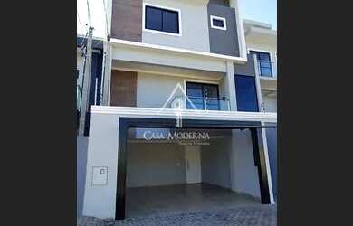 Imagem: A casa possui 1 Dormitório, 3 Banheiros, 2 Vagas na garagem