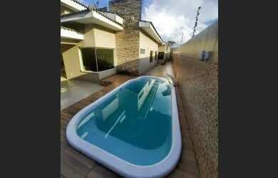 Imagem: A casa possui 4 Dormitórios, 4 Banheiros, 3 Vagas na garagem