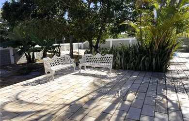 Imagem: A casa possui 5 Dormitórios, 5 Banheiros, 2 Vagas na garagem