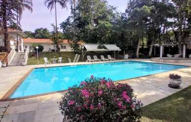 Imagem: A casa em condomínio possui 5 Dormitórios, 5 Banheiros, 5