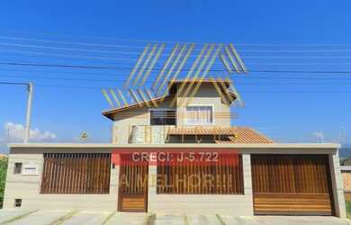 Imagem: A casa possui 4 Dormitórios, 5 Banheiros, 1 Vaga na garagem