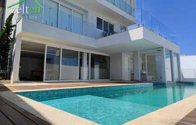 Imagem: A casa em condomínio possui 5 Dormitórios, 5 Banheiros, 4