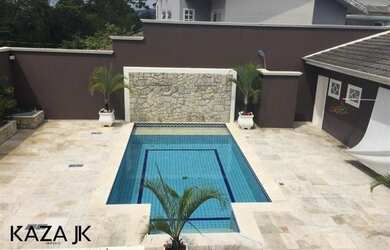 Imagem: A casa em condomínio possui 4 Dormitórios, 5 Banheiros, 5