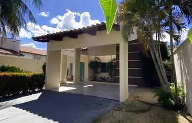 Imagem: A casa possui 3 Dormitórios, 3 Banheiros, 3 Vagas na garagem