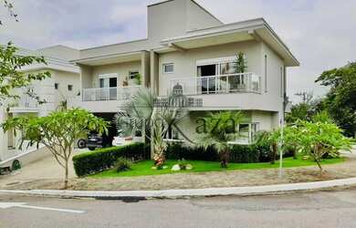 Imagem: A casa em condomínio possui 4 Dormitórios, 5 Banheiros, 4