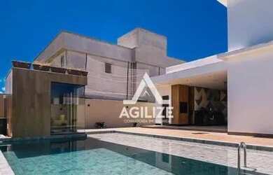 Imagem: A casa em condomínio possui 4 Dormitórios, 4 Banheiros, 2