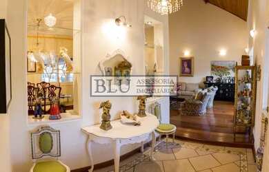 Imagem: A casa em condomínio possui 4 Dormitórios, 5 Banheiros, 4