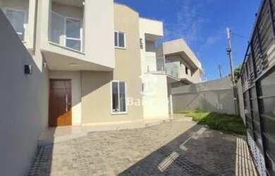 Imagem: A casa possui 3 Dormitórios, 3 Banheiros, 100m² de Área