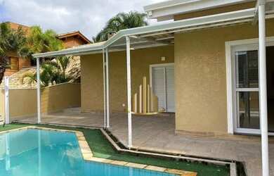 Imagem: A casa em condomínio possui 4 Dormitórios, 5 Banheiros, 5