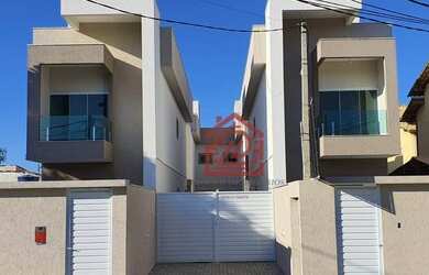 Imagem: A casa possui 2 Dormitórios, 3 Banheiros, 2 Vagas na garagem