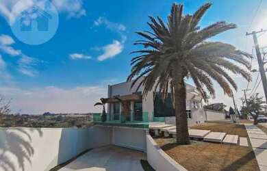 Imagem: A casa em condomínio possui 3 Dormitórios, 5 Banheiros, 347m²