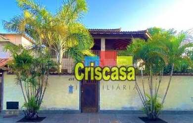 Imagem: A casa possui 5 Dormitórios, 5 Banheiros, 5 Vagas na garagem