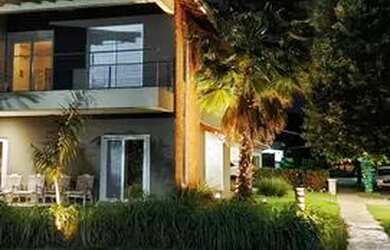 Imagem: A casa em condomínio possui 3 Dormitórios, 4 Banheiros, 4