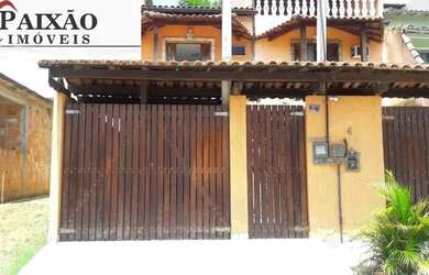 Imagem: A casa possui 2 Dormitórios, 2 Banheiros e 1 Vaga na garagem