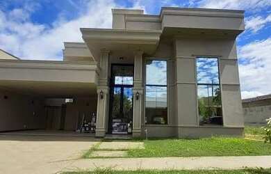 Imagem: A casa possui 3 Dormitórios, 5 Banheiros, 4 Vagas na garagem