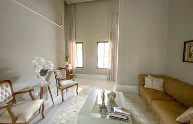 Imagem: A casa possui 4 Dormitórios, 5 Banheiros, 5 Vagas na garagem