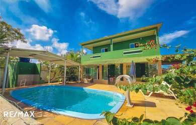 Imagem: A casa possui 5 Dormitórios, 5 Banheiros, 5 Vagas na garagem