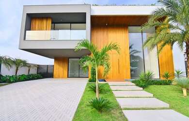 Imagem: A casa em condomínio possui 5 Dormitórios, 5 Banheiros, 2