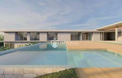 Imagem: A casa em condomínio à venda possui 5 Dormitórios, 5 Banheiros