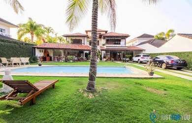 Imagem: A casa em condomínio possui 5 Dormitórios, 5 Banheiros, 5