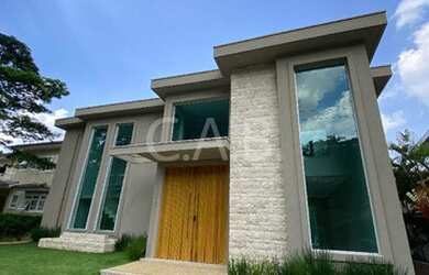 Imagem: A casa em condomínio possui 5 Dormitórios, 5 Banheiros, 5