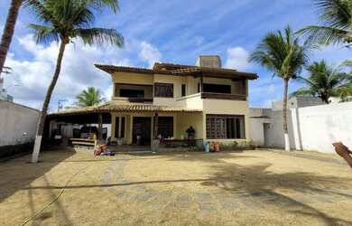 Imagem: A casa possui 4 Dormitórios, 4 Banheiros, 4 Vagas na garagem