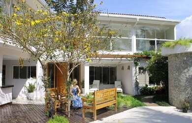 Imagem: A casa em condomínio possui 5 Dormitórios, 5 Banheiros, 2